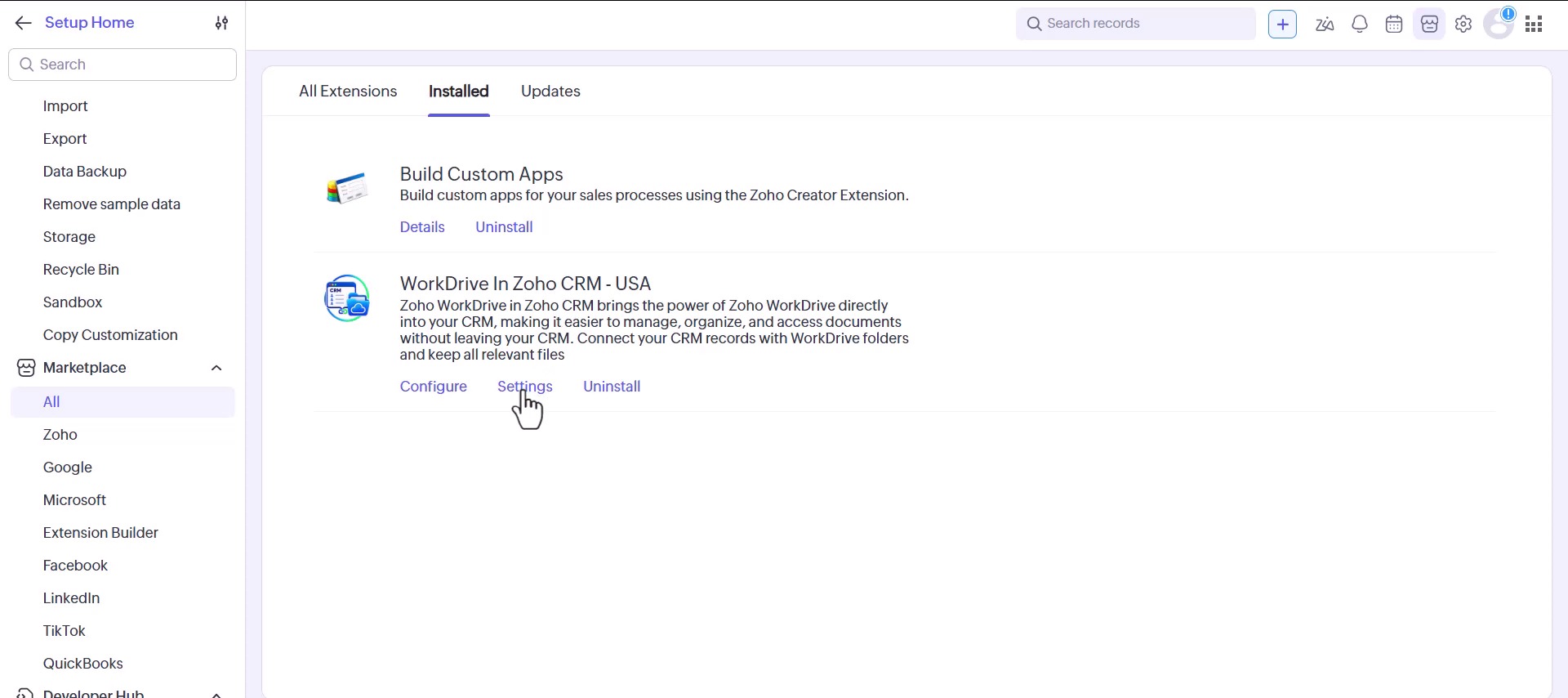 Zoho CRM Marketplace on the Installed tab, with the Settings link under the WorkDrive In Zoho CRM extension